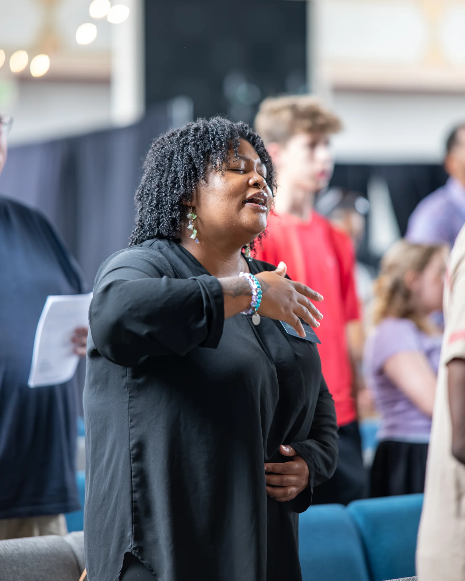 People welcoming one another at Bridge City Church