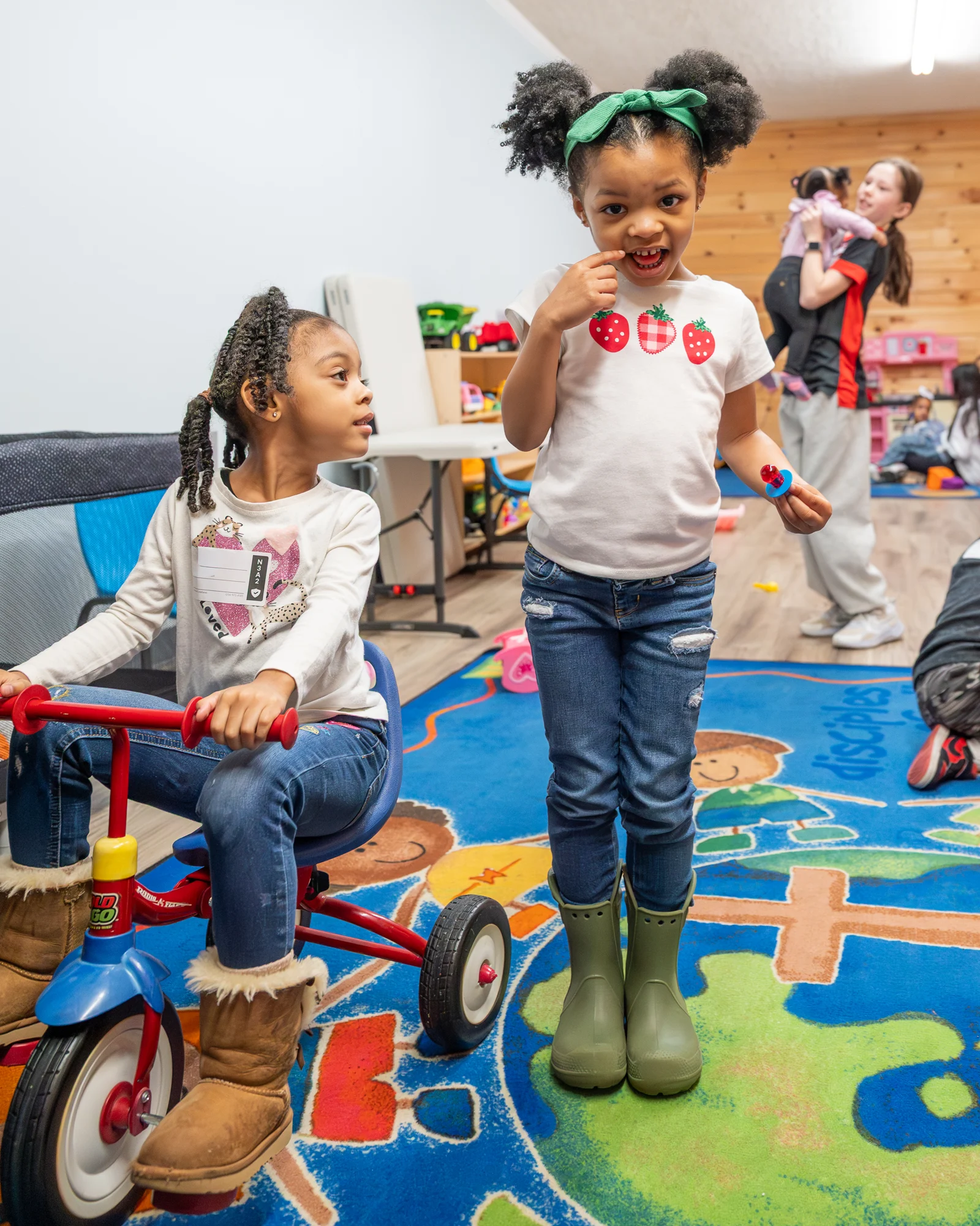 Children playing together in a BCC children’s room