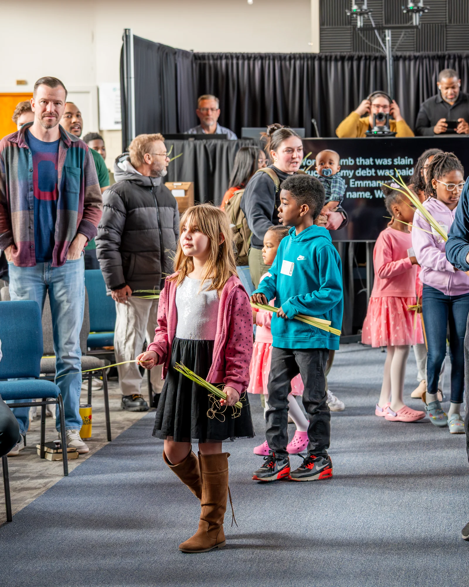 Children participating in worship at Bridge City Church